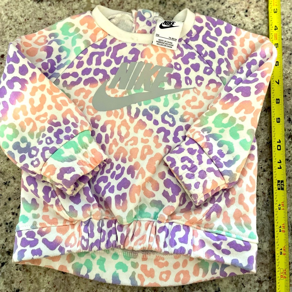 Girls multi colored cheetah print Nike top